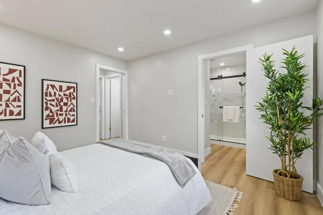 a bathroom with a glass shower door
