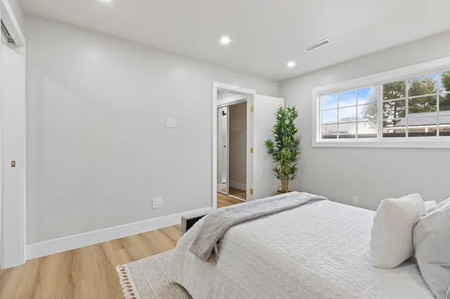 a view of a workspace with furniture