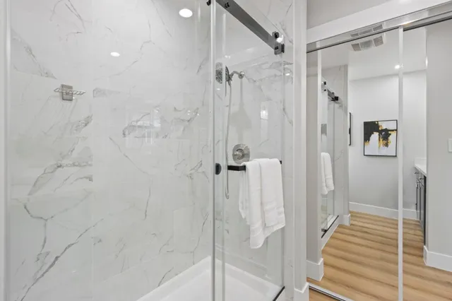 a view of a house with backyard and porch