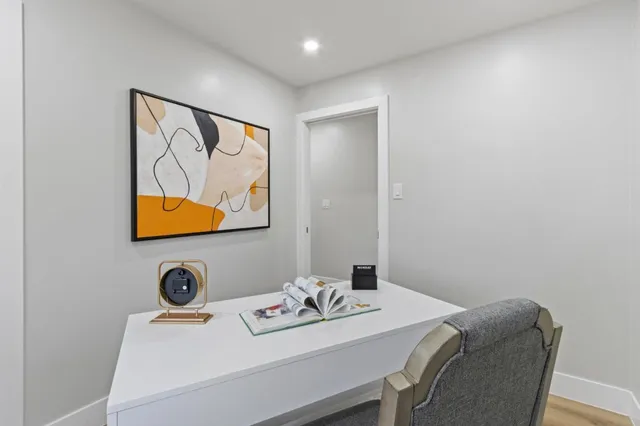 a living room with couches and a coffee table with wooden floor