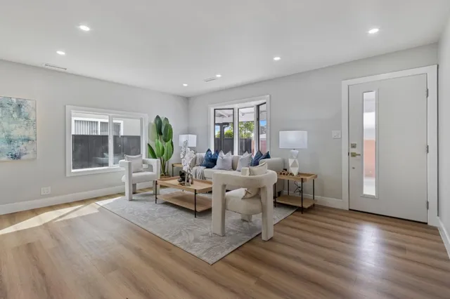 a living room with furniture and a couch