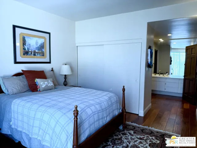a bathroom with a sink vanity and a mirror