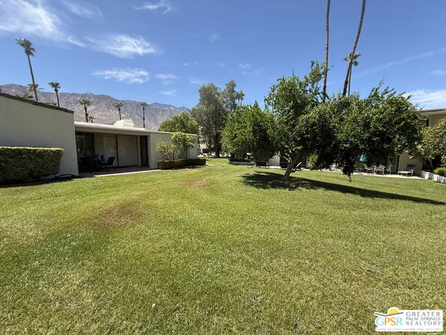 a view of a lake with a sitting area