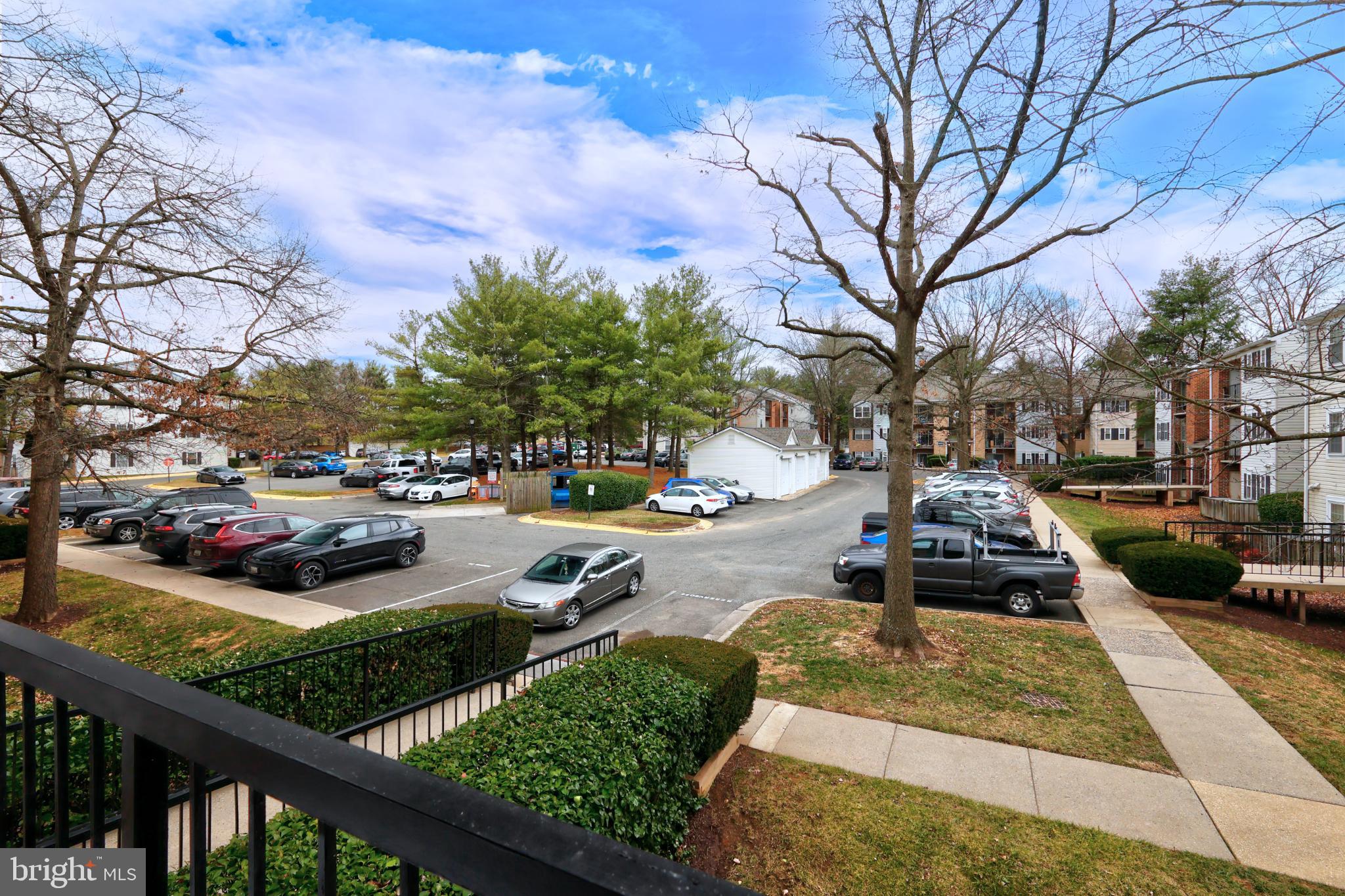 18334 Streamside Drive, Unit 201 Gaithersburg, MD 20879 - Photo 22 of 22 a view of a park with large trees