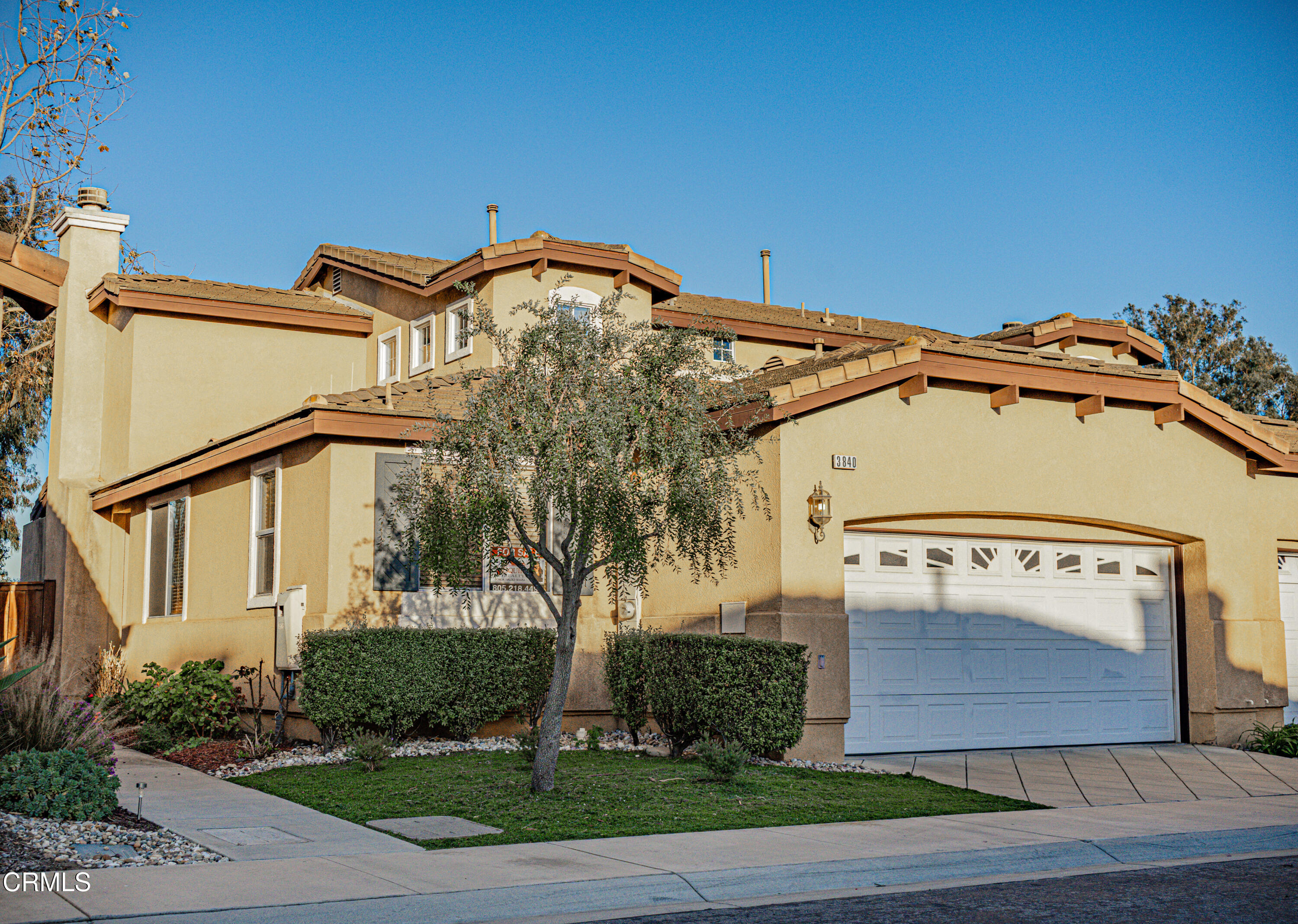 3840 Shakespeare Drive Oxnard, CA 93033 - Photo 1 of 46 a front view of a building with garden