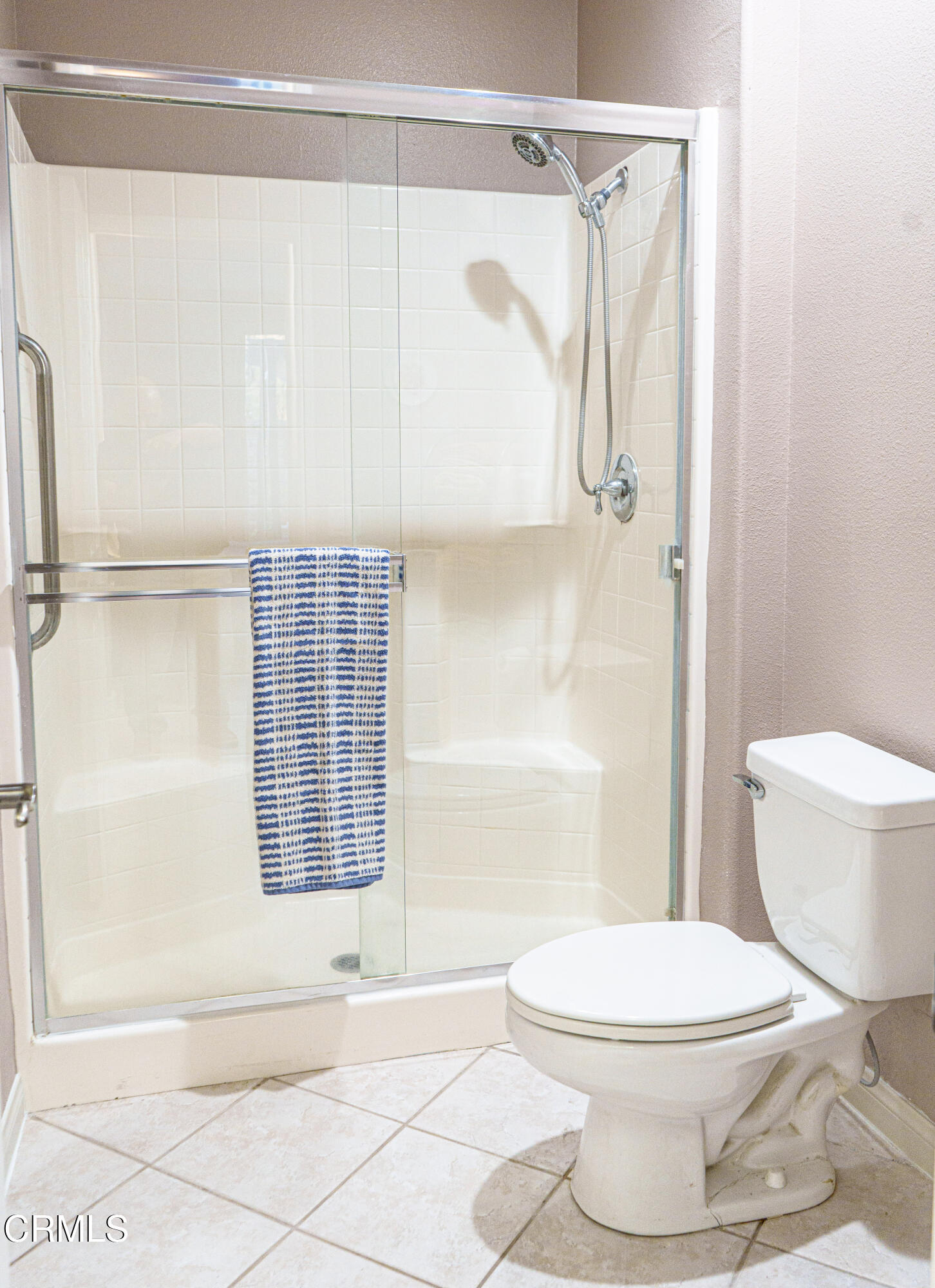 3840 Shakespeare Drive Oxnard, CA 93033 - Photo 19 of 46 a bathroom with a toilet and a shower