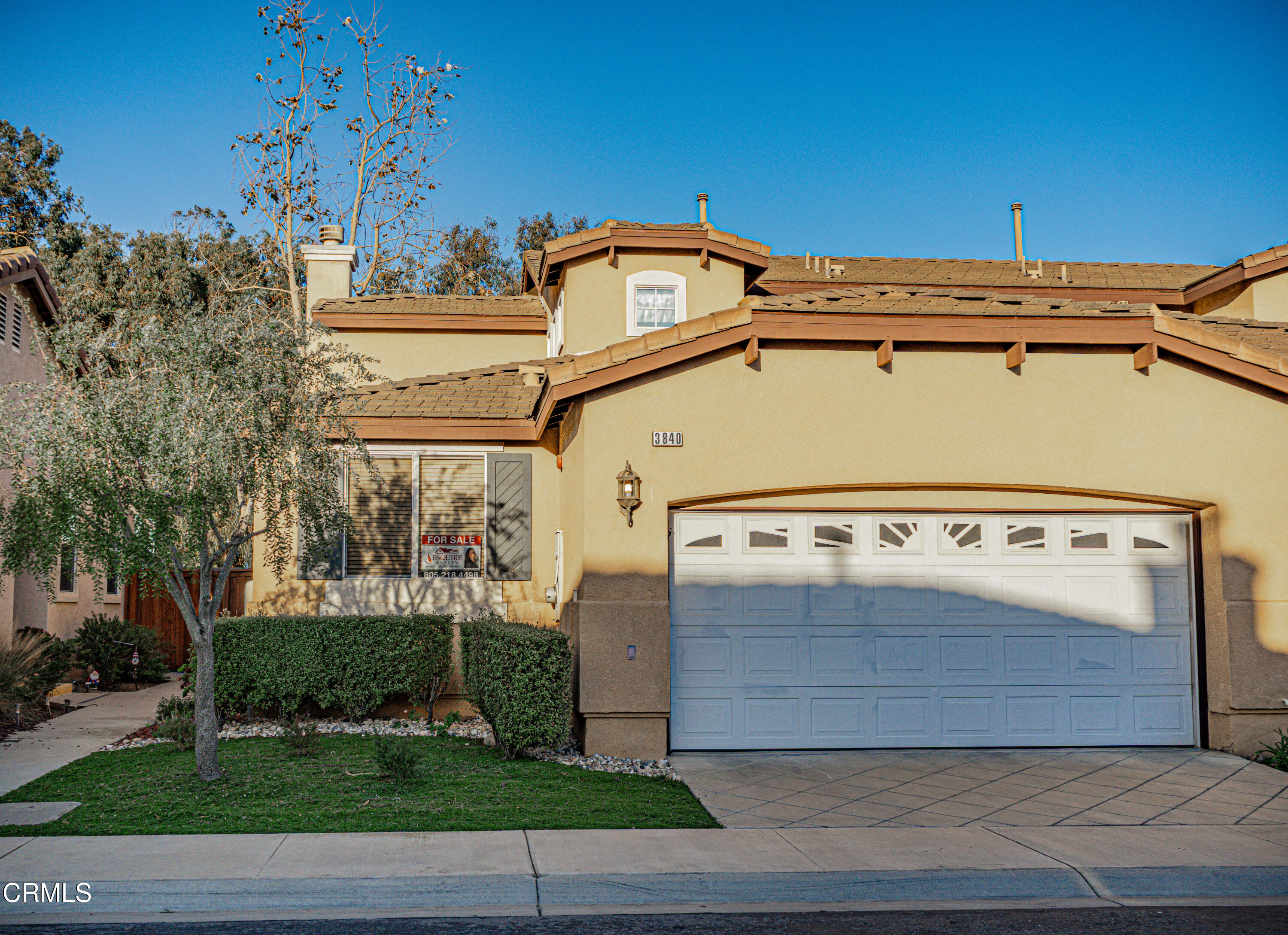 3840 Shakespeare Drive Oxnard, CA 93033 - Photo 2 of 46 a view of a street with a building in the background