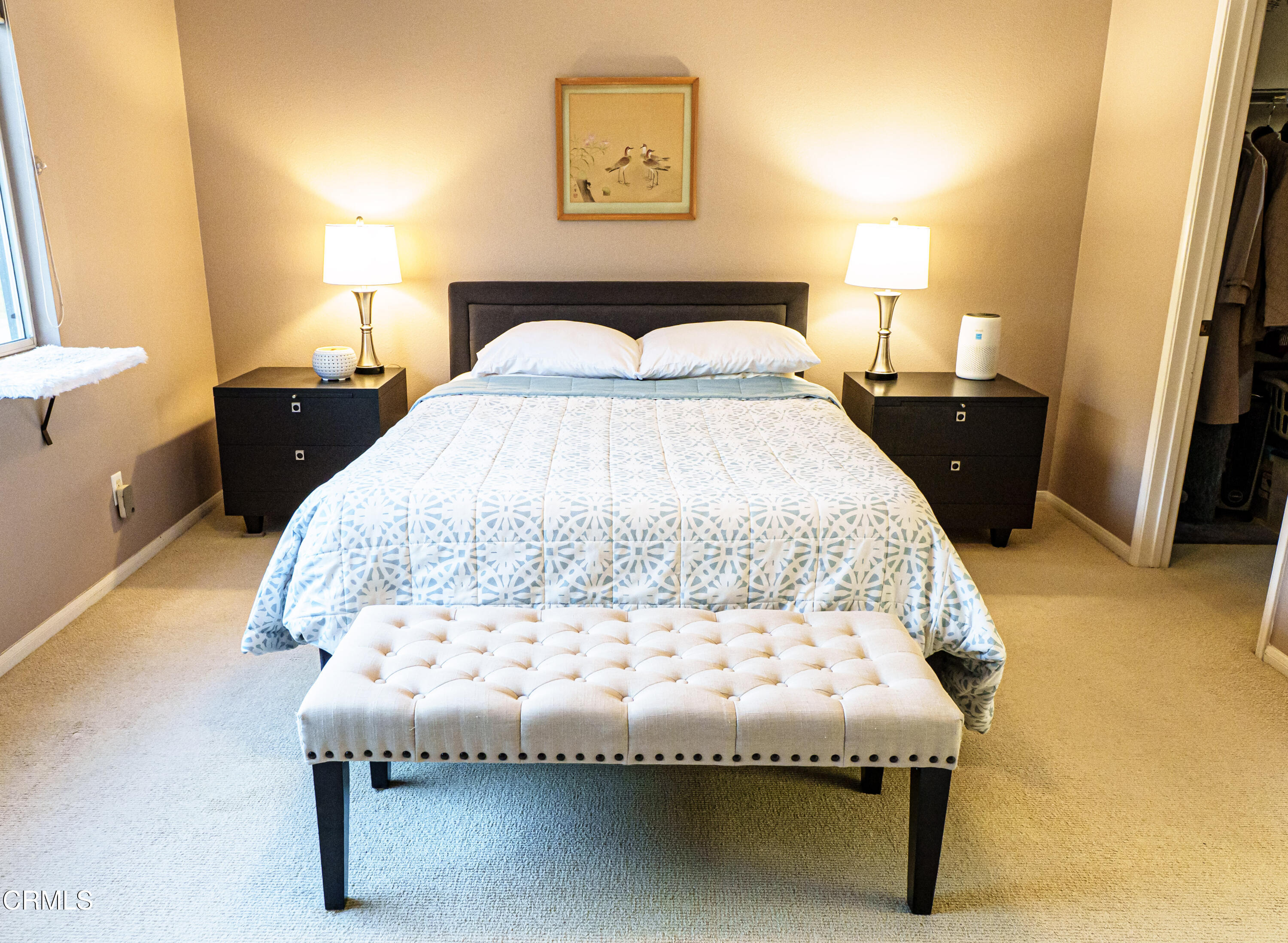 3840 Shakespeare Drive Oxnard, CA 93033 - Photo 24 of 46 a bedroom with a bed and wooden floor