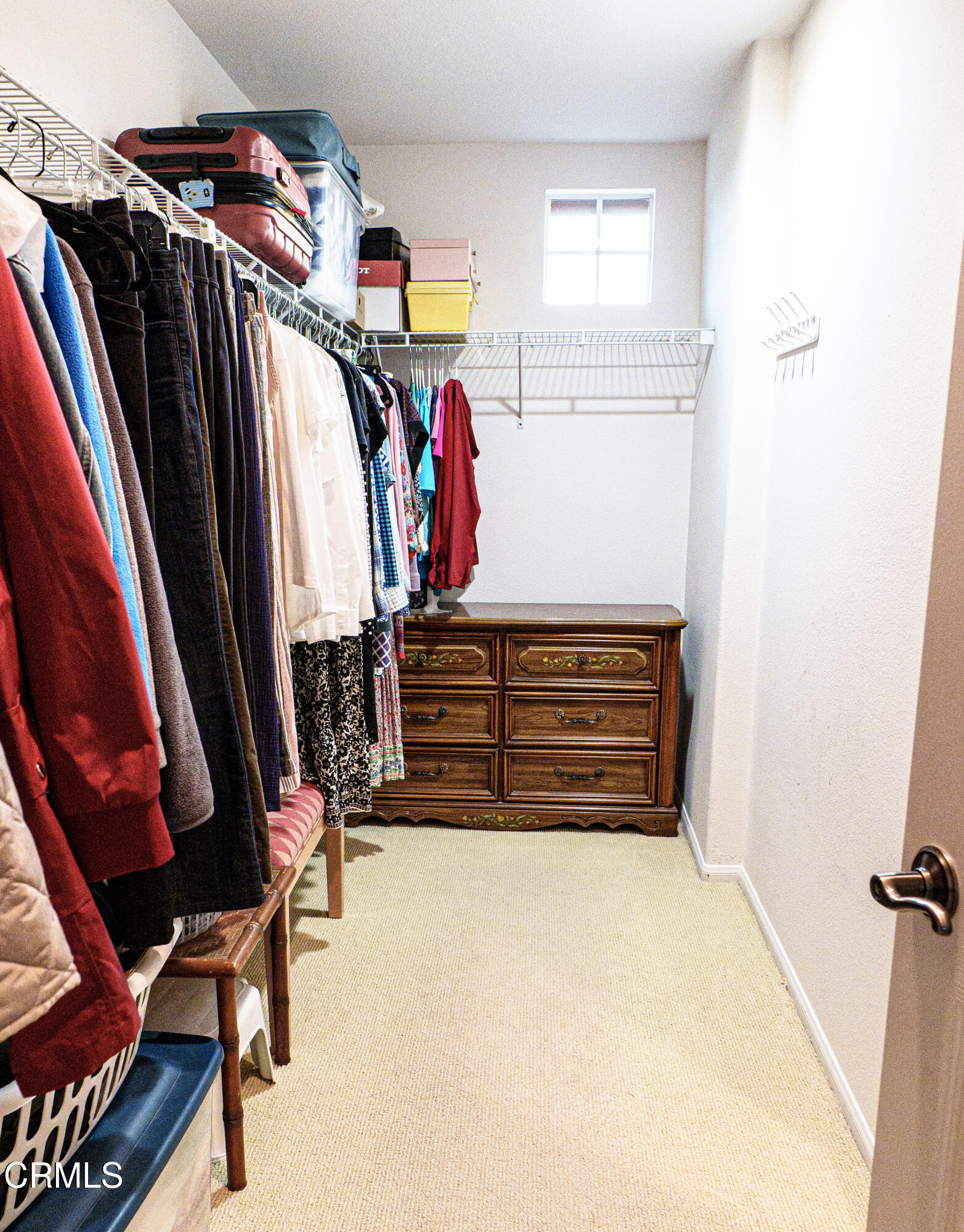 3840 Shakespeare Drive Oxnard, CA 93033 - Photo 27 of 46 a view of walk in closet with clothes and shoes