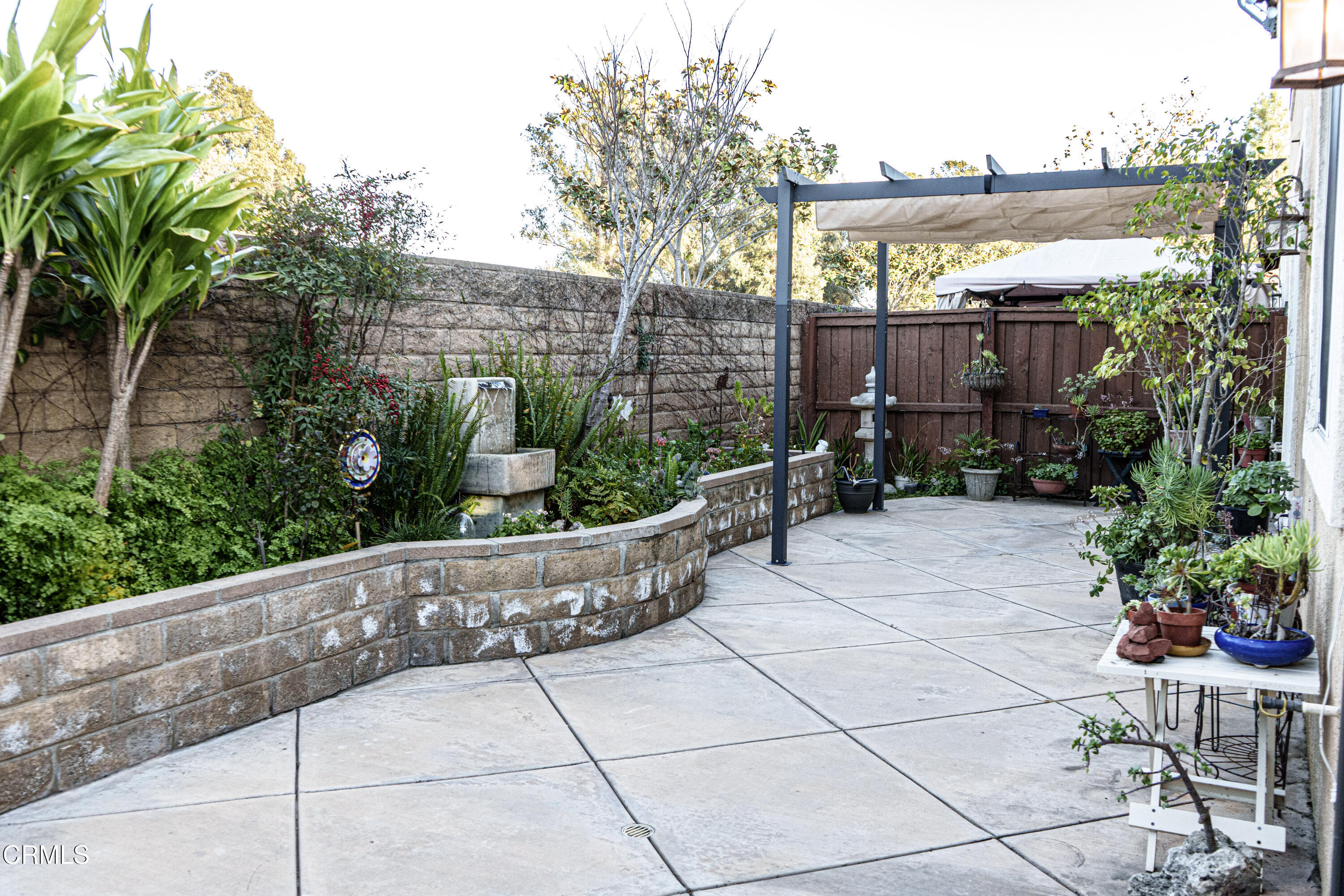 3840 Shakespeare Drive Oxnard, CA 93033 - Photo 32 of 46 a wooden bench sitting in front of a building