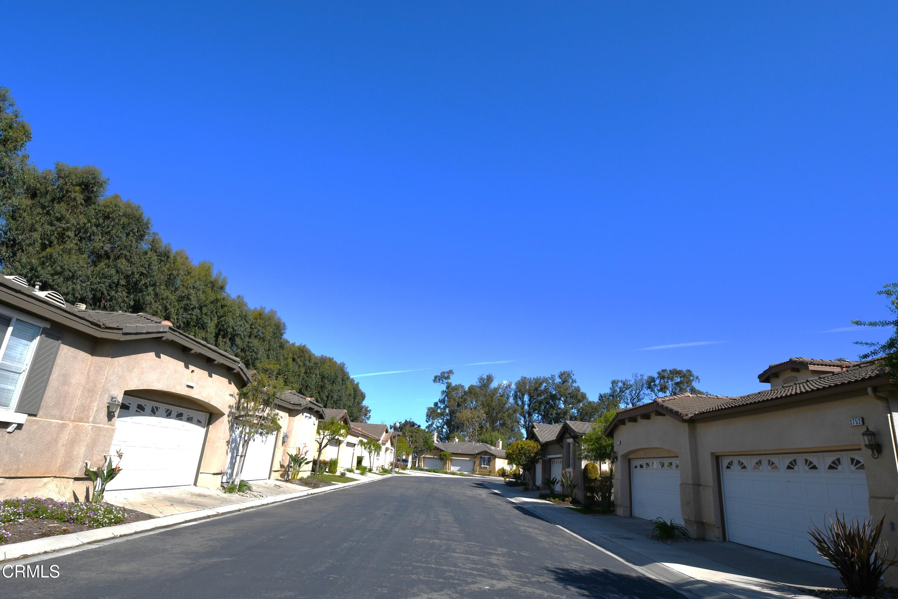 3840 Shakespeare Drive Oxnard, CA 93033 - Photo 42 of 46 a view of a street with a building in the background