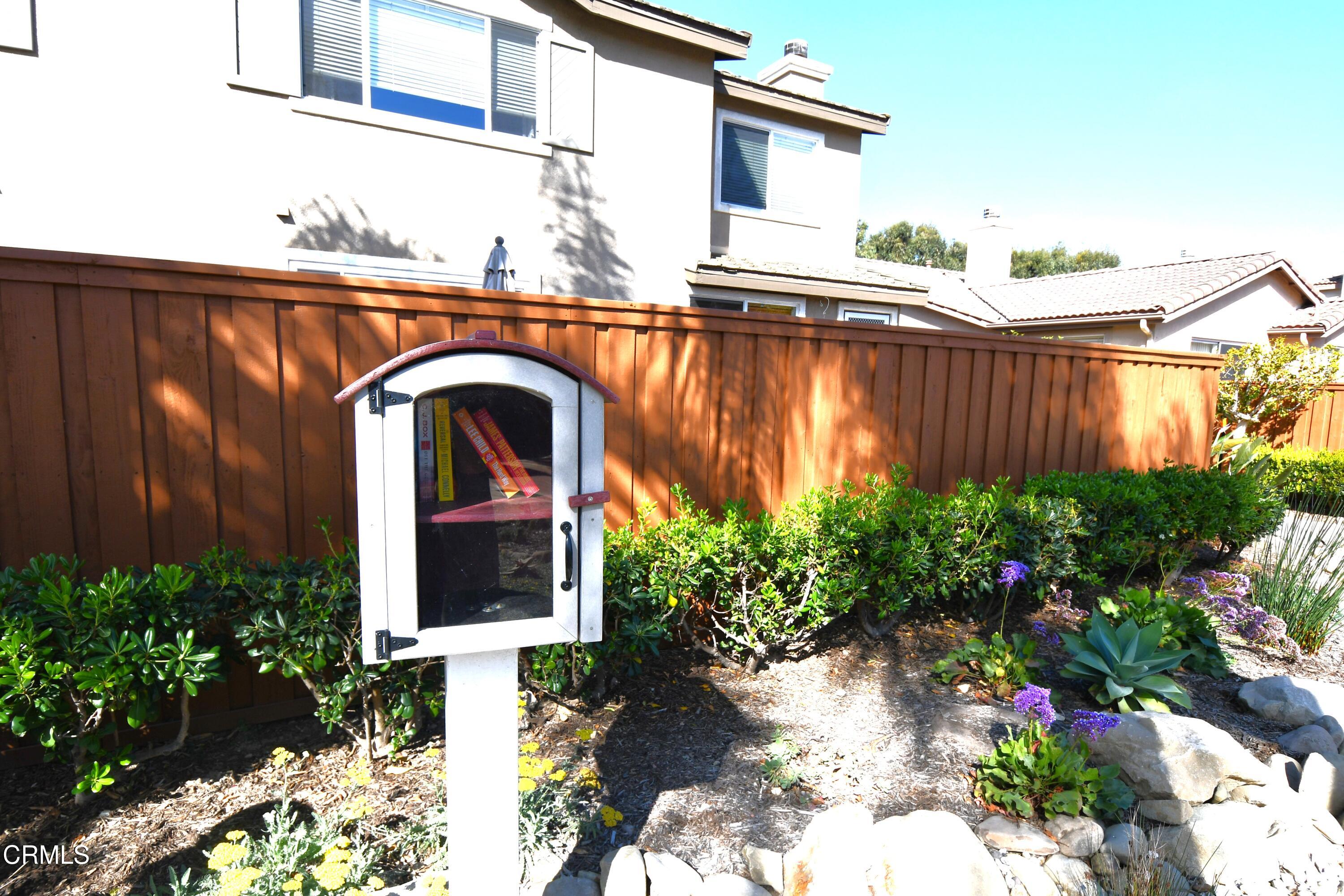 3840 Shakespeare Drive Oxnard, CA 93033 - Photo 43 of 46 a front view of a house with a garden