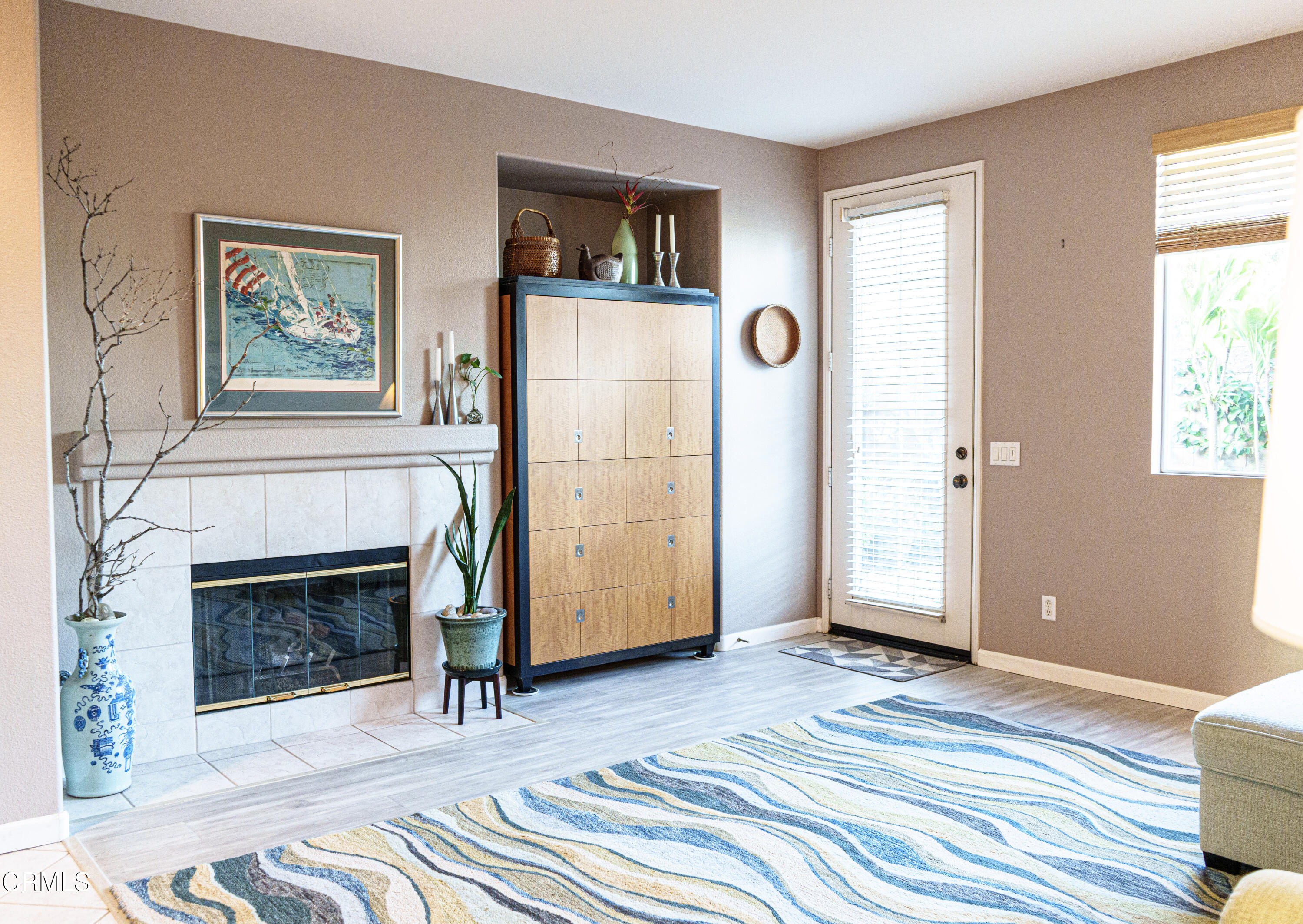 3840 Shakespeare Drive Oxnard, CA 93033 - Photo 6 of 46 a view of a livingroom with a fireplace and window