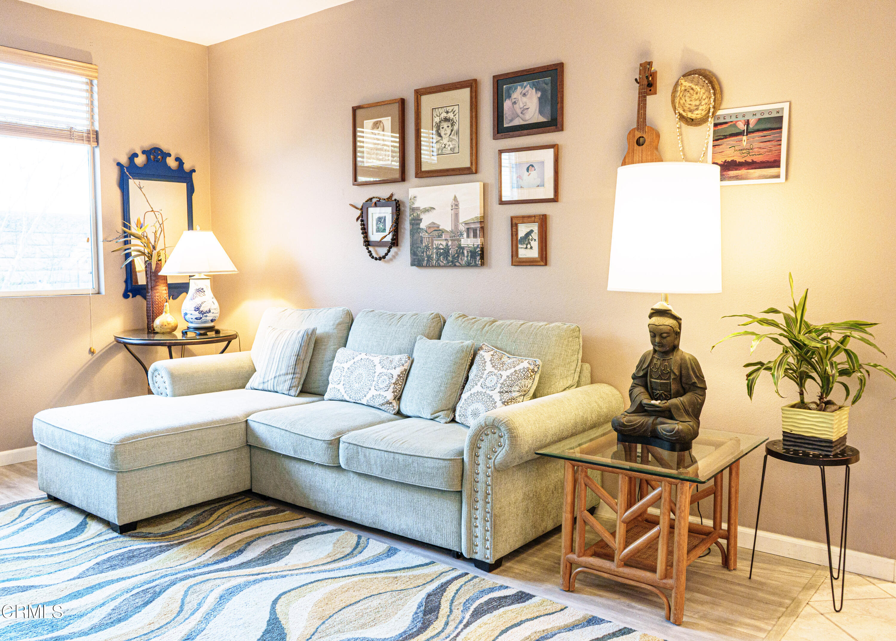 3840 Shakespeare Drive Oxnard, CA 93033 - Photo 7 of 46 a living room with furniture and painting on the wall
