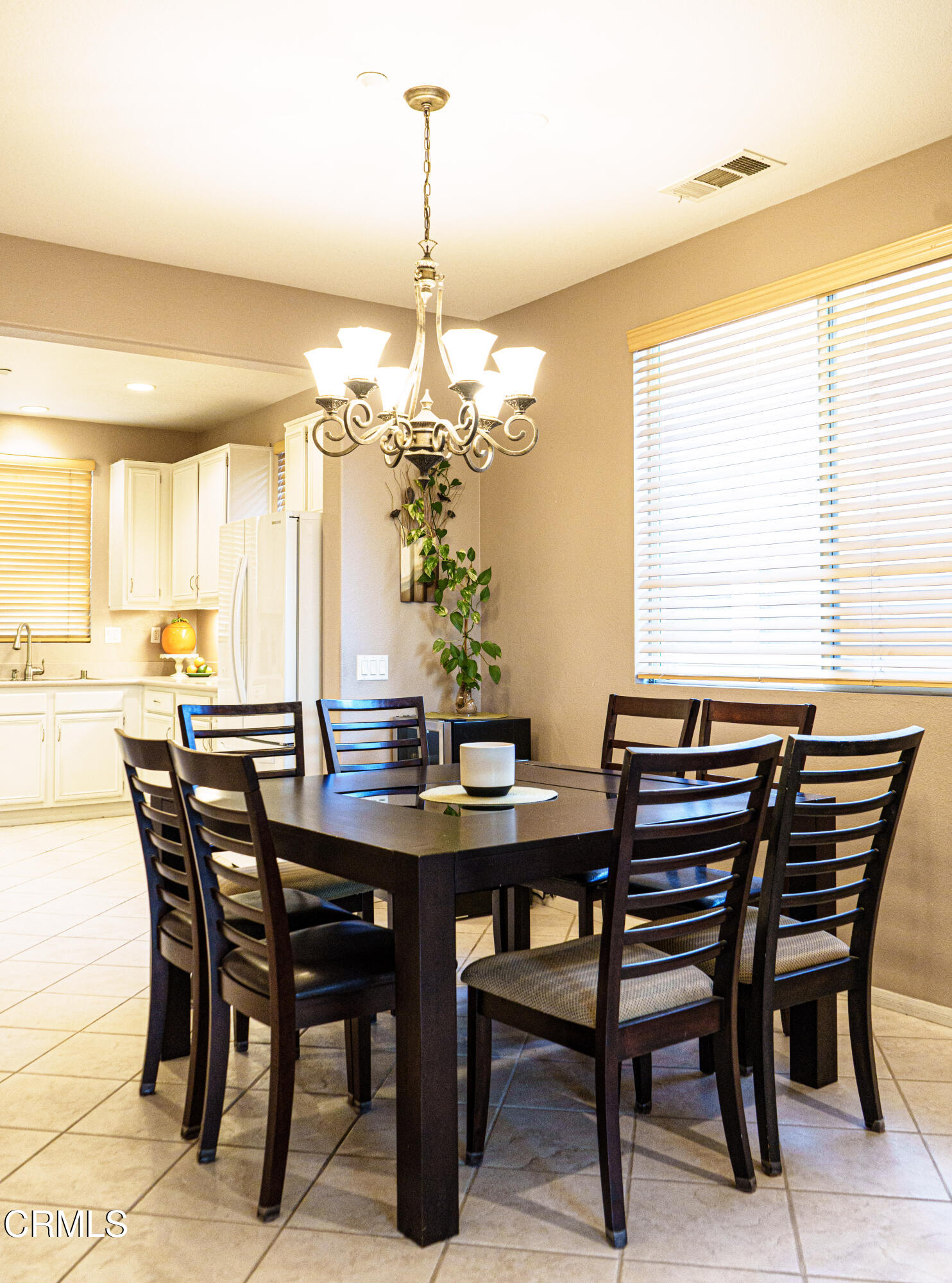 3840 Shakespeare Drive Oxnard, CA 93033 - Photo 10 of 46 a view of a dining room with furniture and window