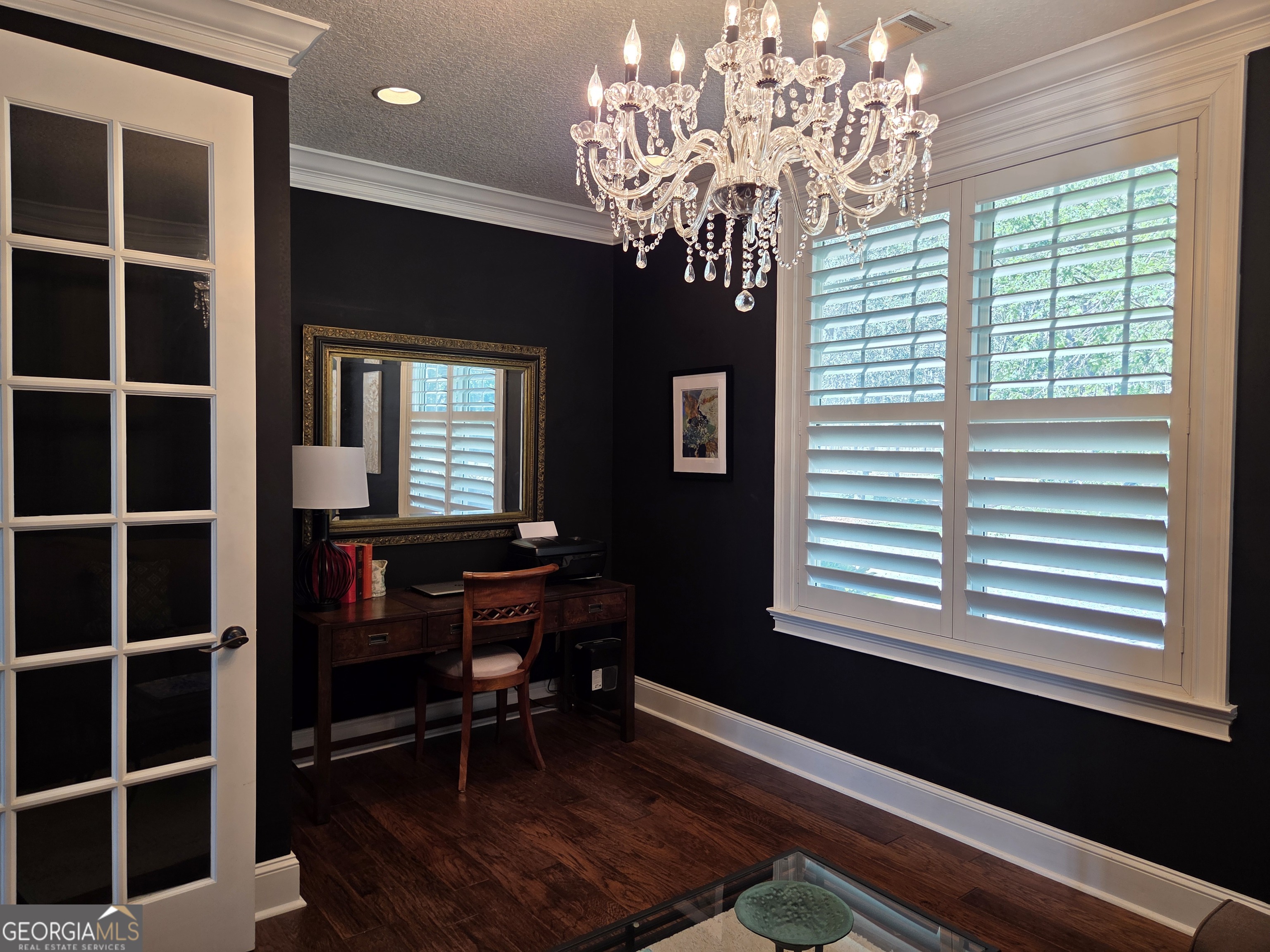 300 Hammond Powell Road Hazlehurst, GA 31539 - Photo 50 of 91 a view of a room with windows and wooden walls