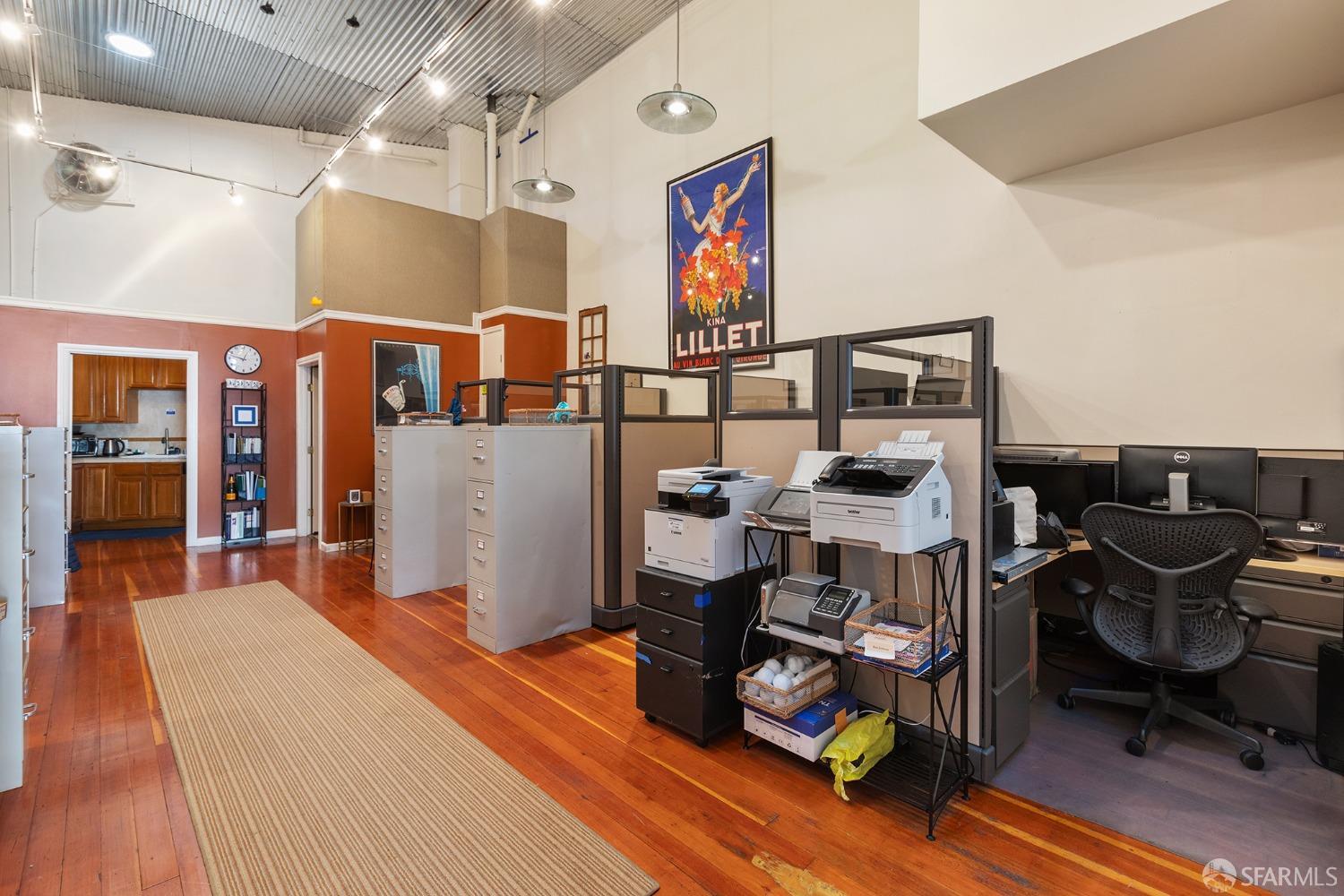 67-71 Haight Street San Francisco, CA 94102 - Photo 17 of 25 a bedroom with furniture and a gym machine