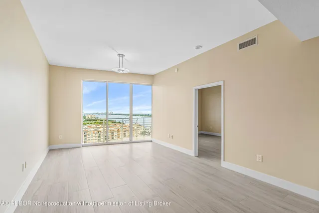 a view of a building with sitting area