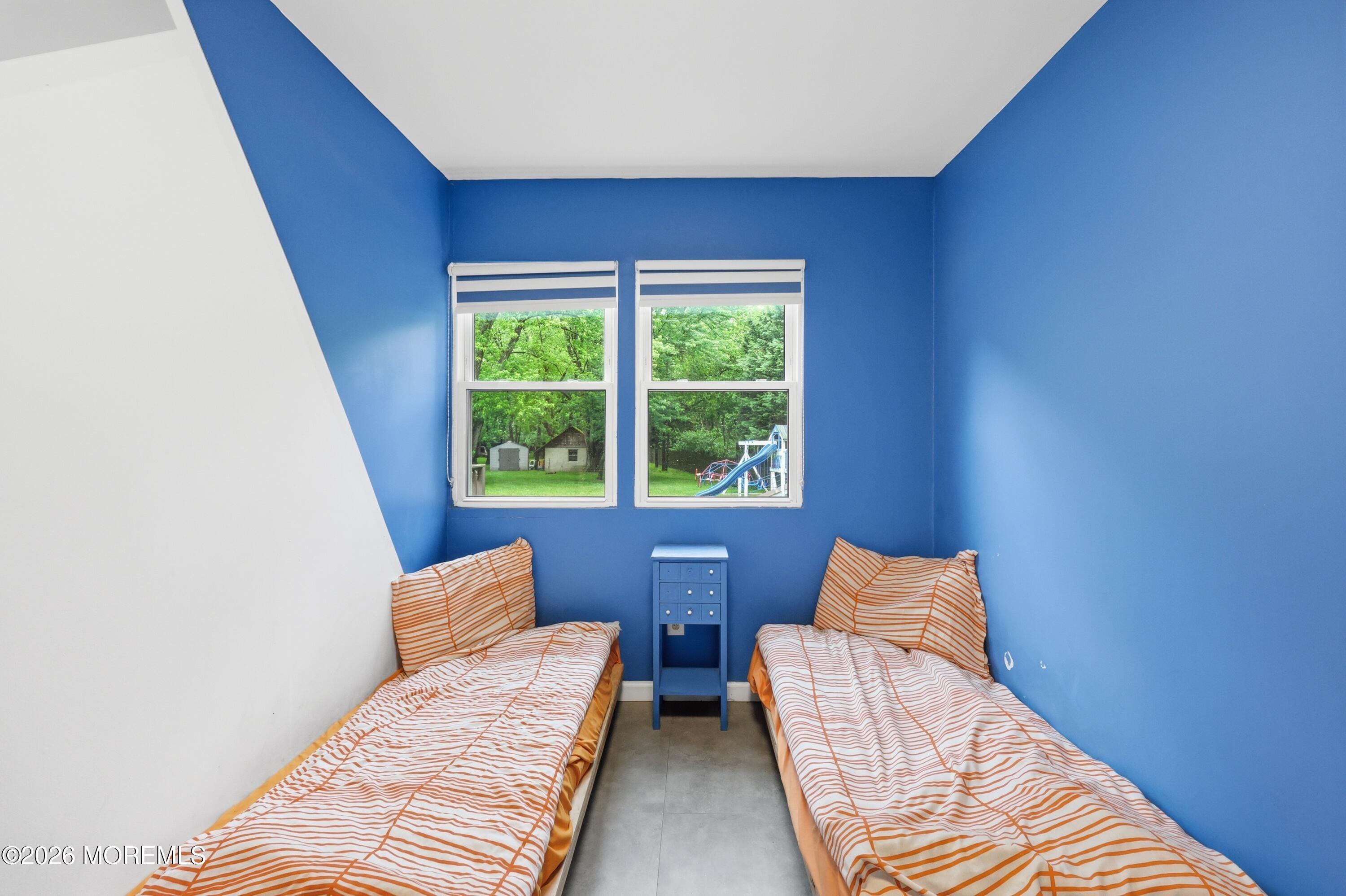 1845 Old Freehold Road Toms River, NJ 08755 - Photo 18 of 27 a bedroom with two beds and a window