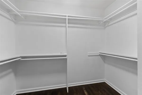 a view of an empty walk in closet