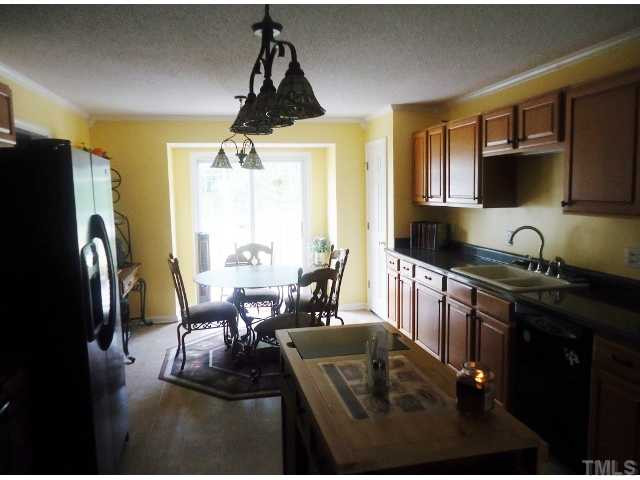 100 Harris Road Smithfield, NC 27577 - Photo 10 of 22 With Breakfast area and walkout to deck