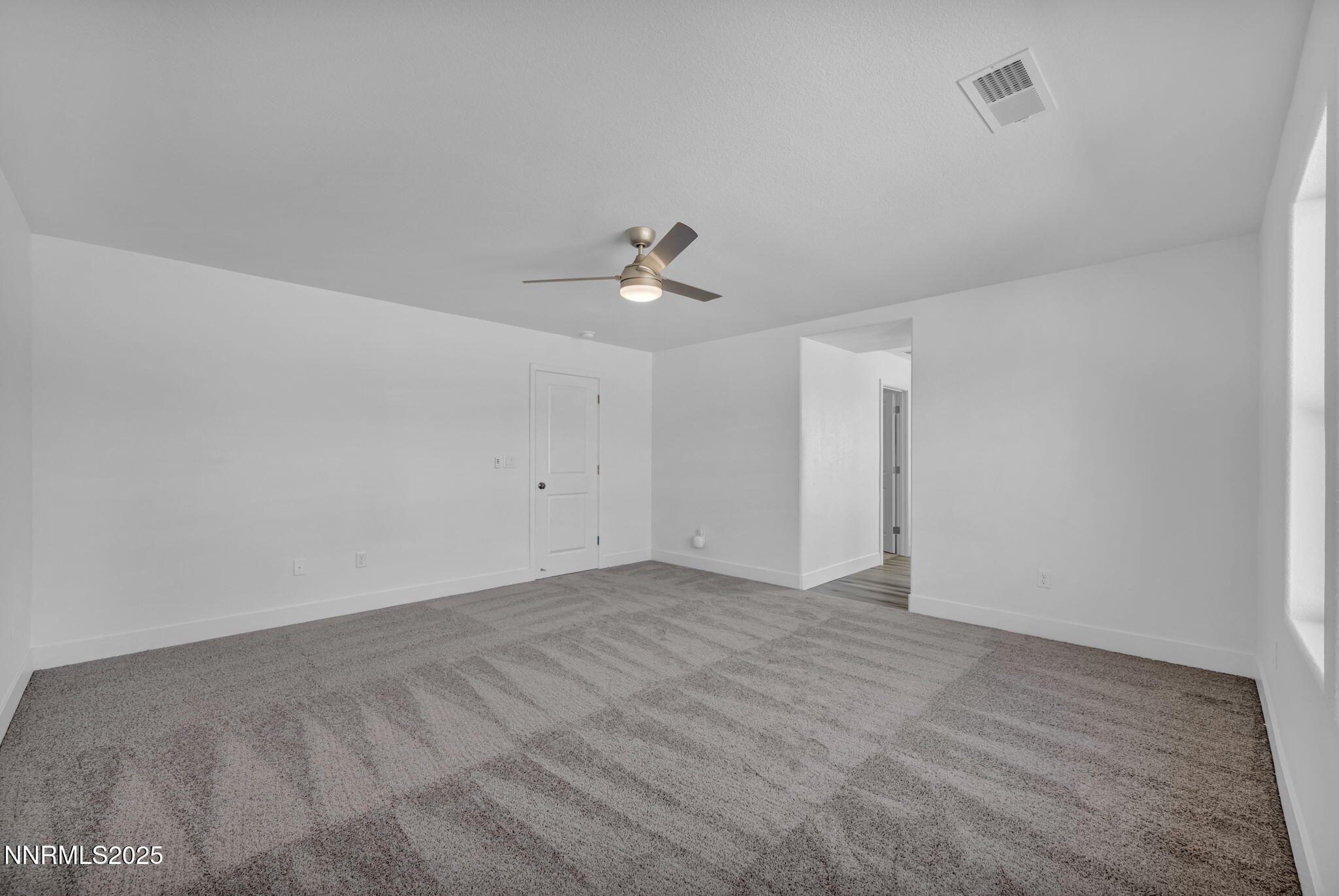 1322 Nebula Road, Unit HOMESITE 92 Carson City, NV 89705 - Photo 14 of 22 wooden floor in an empty room