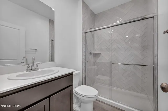 a view of a house with a snow in the background