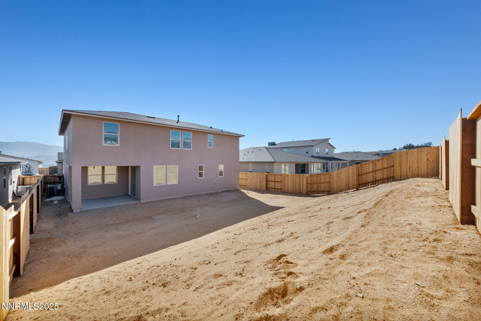 1322 Nebula Road, Unit HOMESITE 92 Carson City, NV 89705 - Photo 20 of 22 a view of a house with a snow in the background