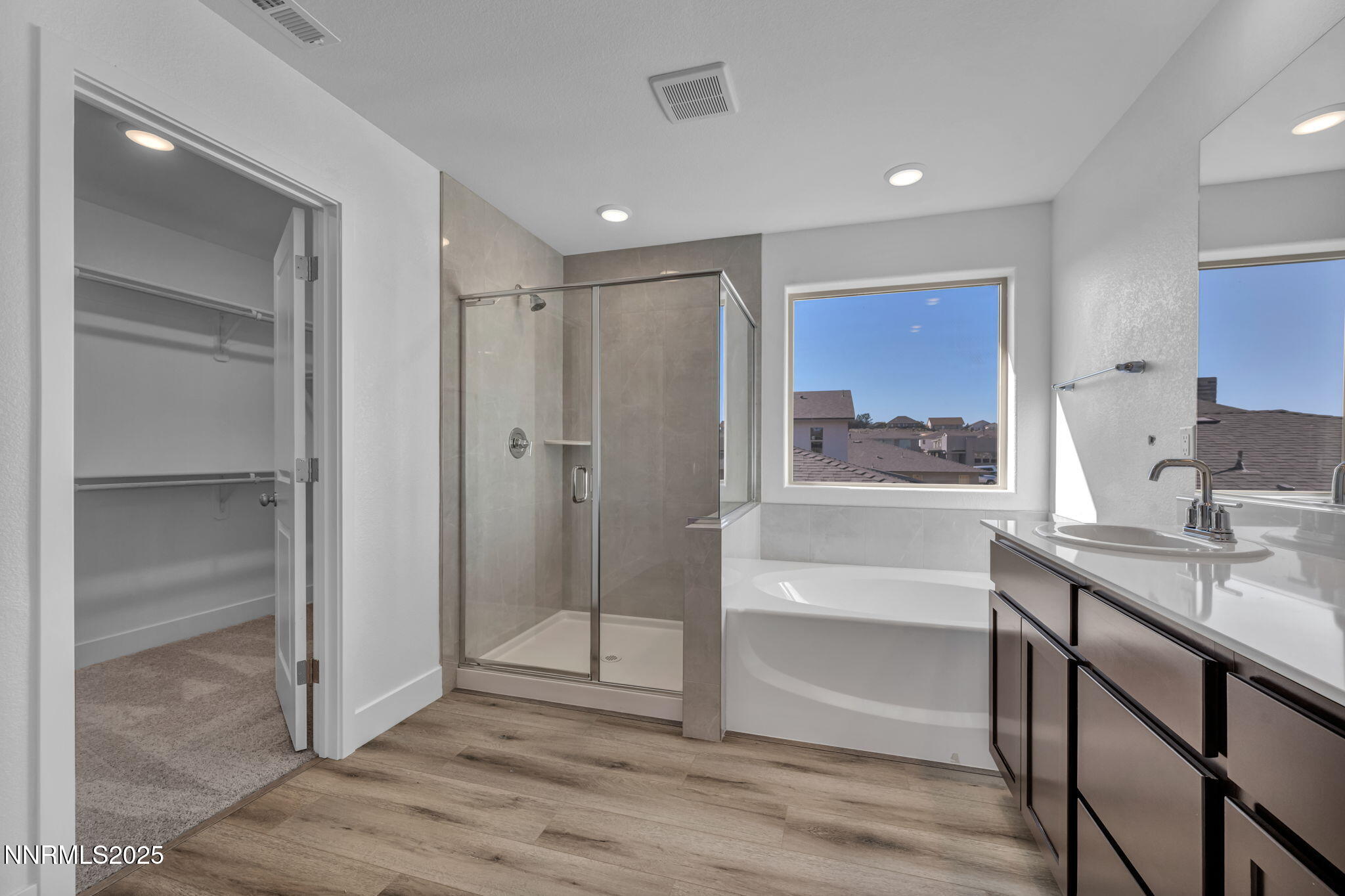 1322 Nebula Road, Unit HOMESITE 92 Carson City, NV 89705 - Photo 9 of 22 a bathroom with a sink and a mirror
