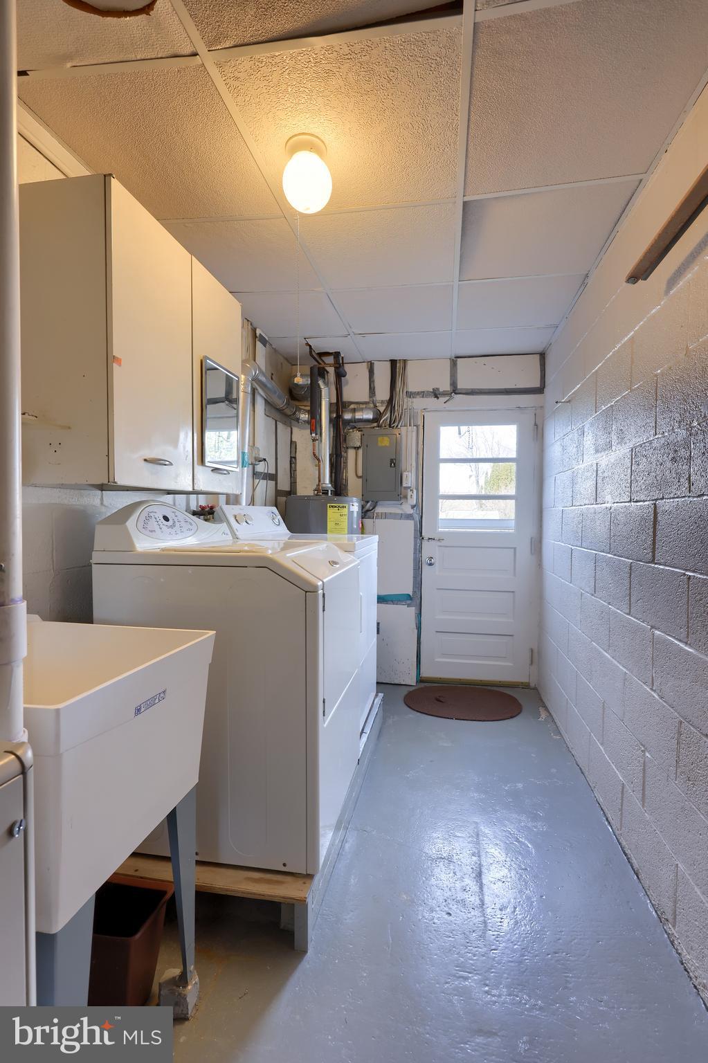 125 2nd Street Reading, PA 19607 - Photo 22 of 35 Laundry Sink and Back Yard Exit