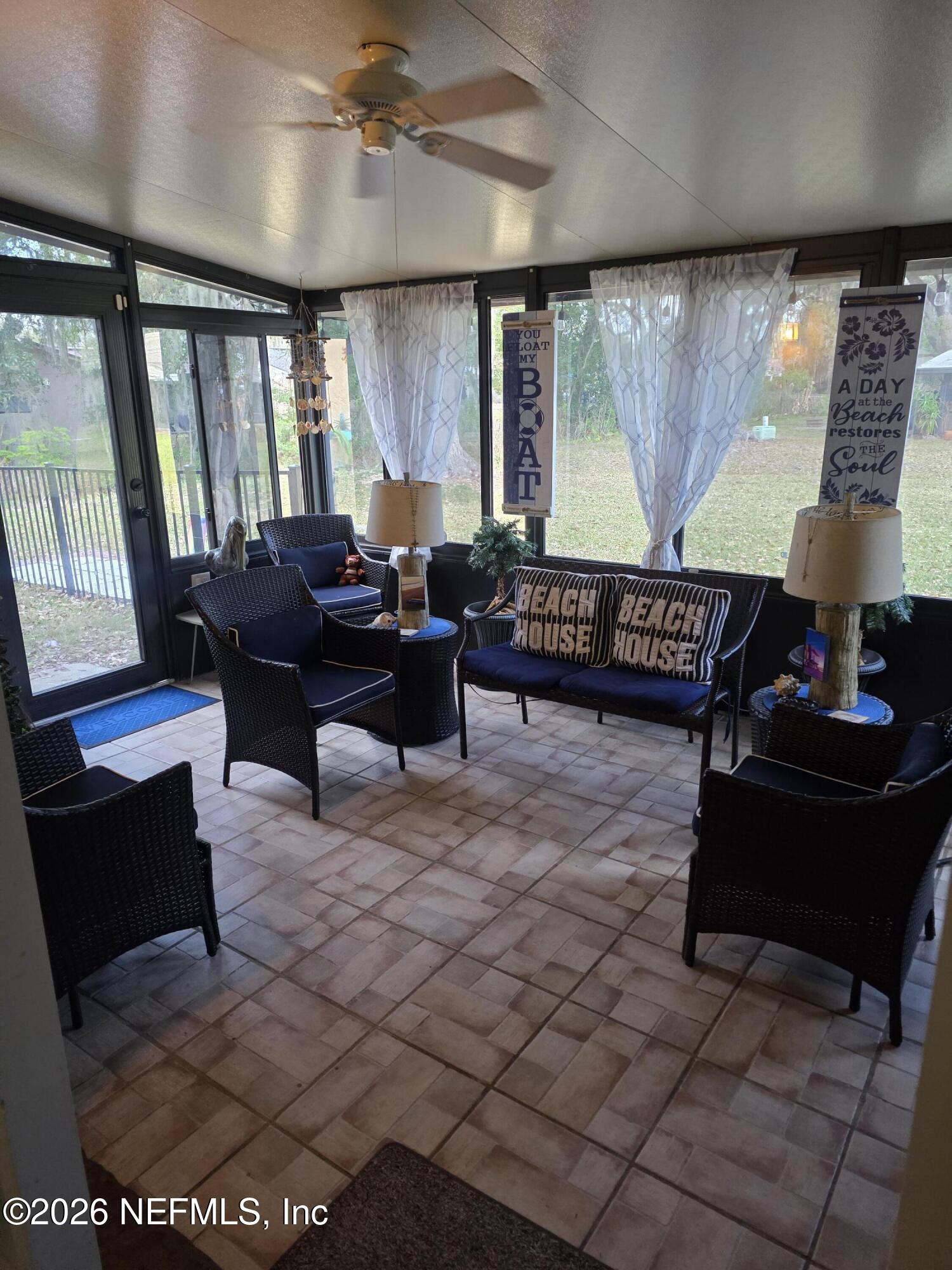 1259 The Grove Road Orange Park, FL 32073 - Photo 13 of 19 a living room with furniture and a large window