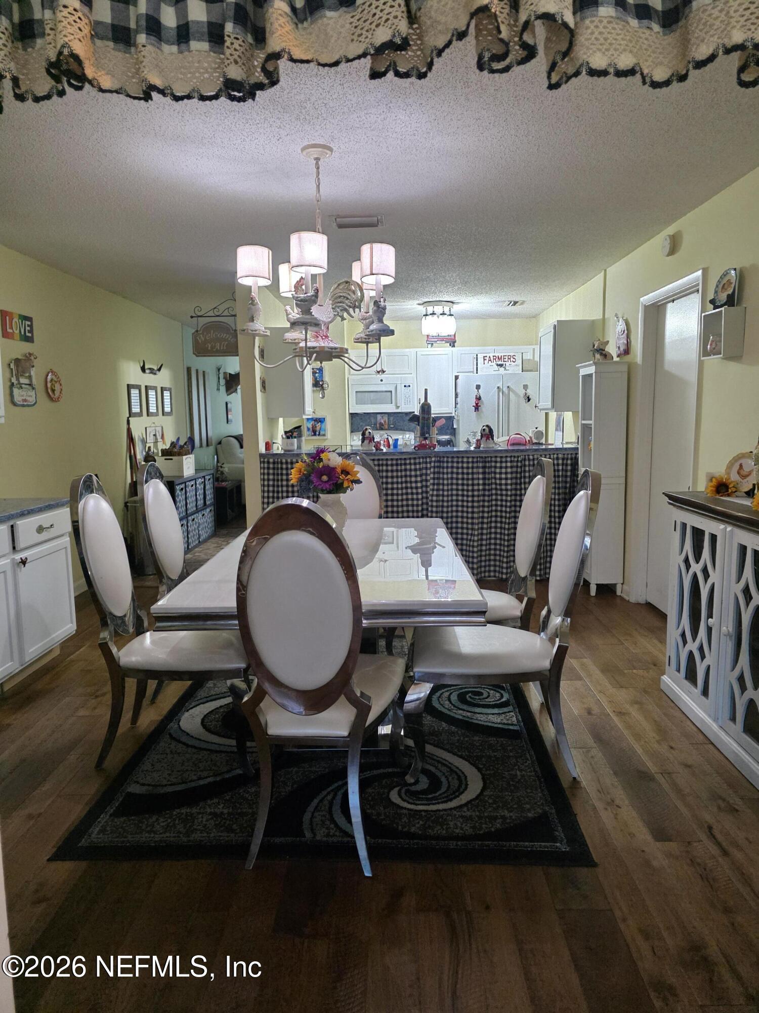 1259 The Grove Road Orange Park, FL 32073 - Photo 5 of 19 a view of a dining room with furniture