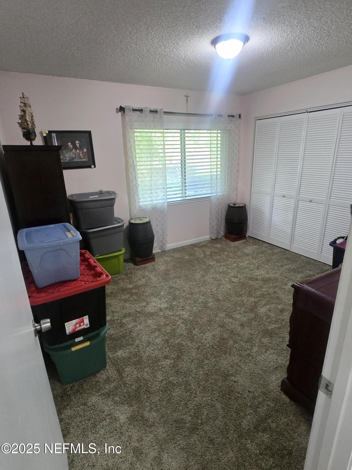 1259 The Grove Road Orange Park, FL 32073 - Photo 9 of 17 a living room with furniture