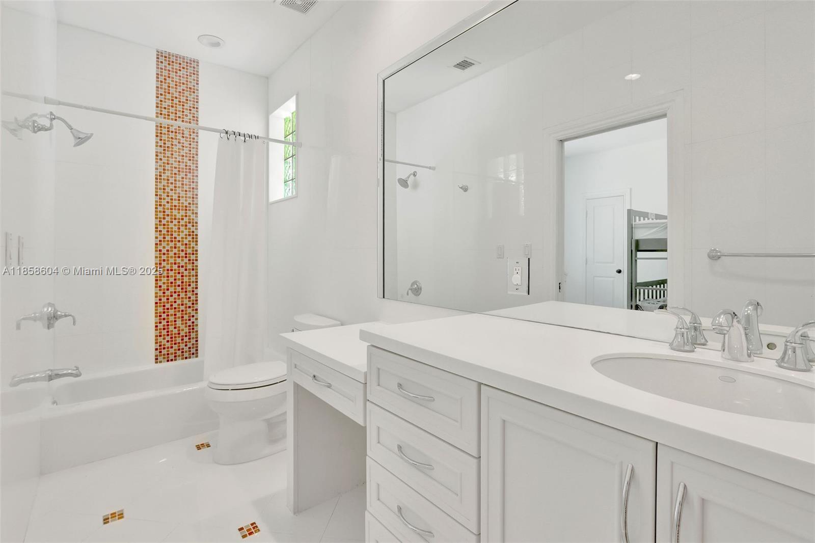 7261 Southwest 120th Avenue Miami, FL 33183 - Photo 24 of 50 a bathroom with a sink a toilet and shower