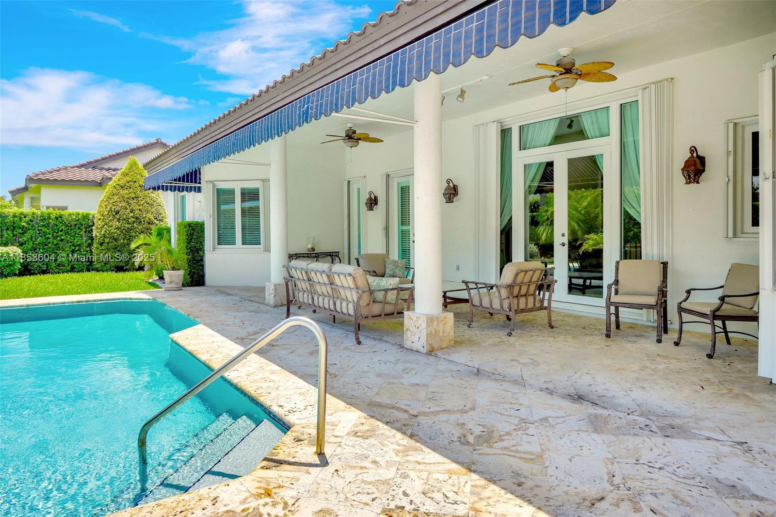 7261 Southwest 120th Avenue Miami, FL 33183 - Photo 40 of 50 a view of a house with backyard porch and sitting area