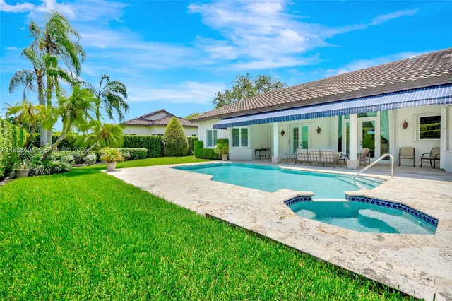 a view of a house with big yard