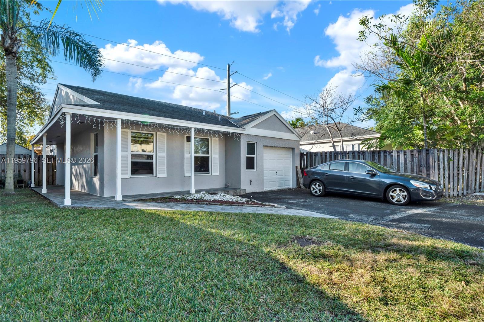 14600 Southwest 124th Place Miami, FL 33186 - Photo 1 of 34 a view of a house with backyard and sitting area