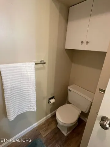 a bathroom with a toilet and a sink