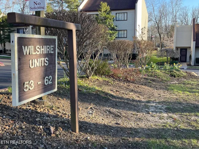 a sign on the side of the road