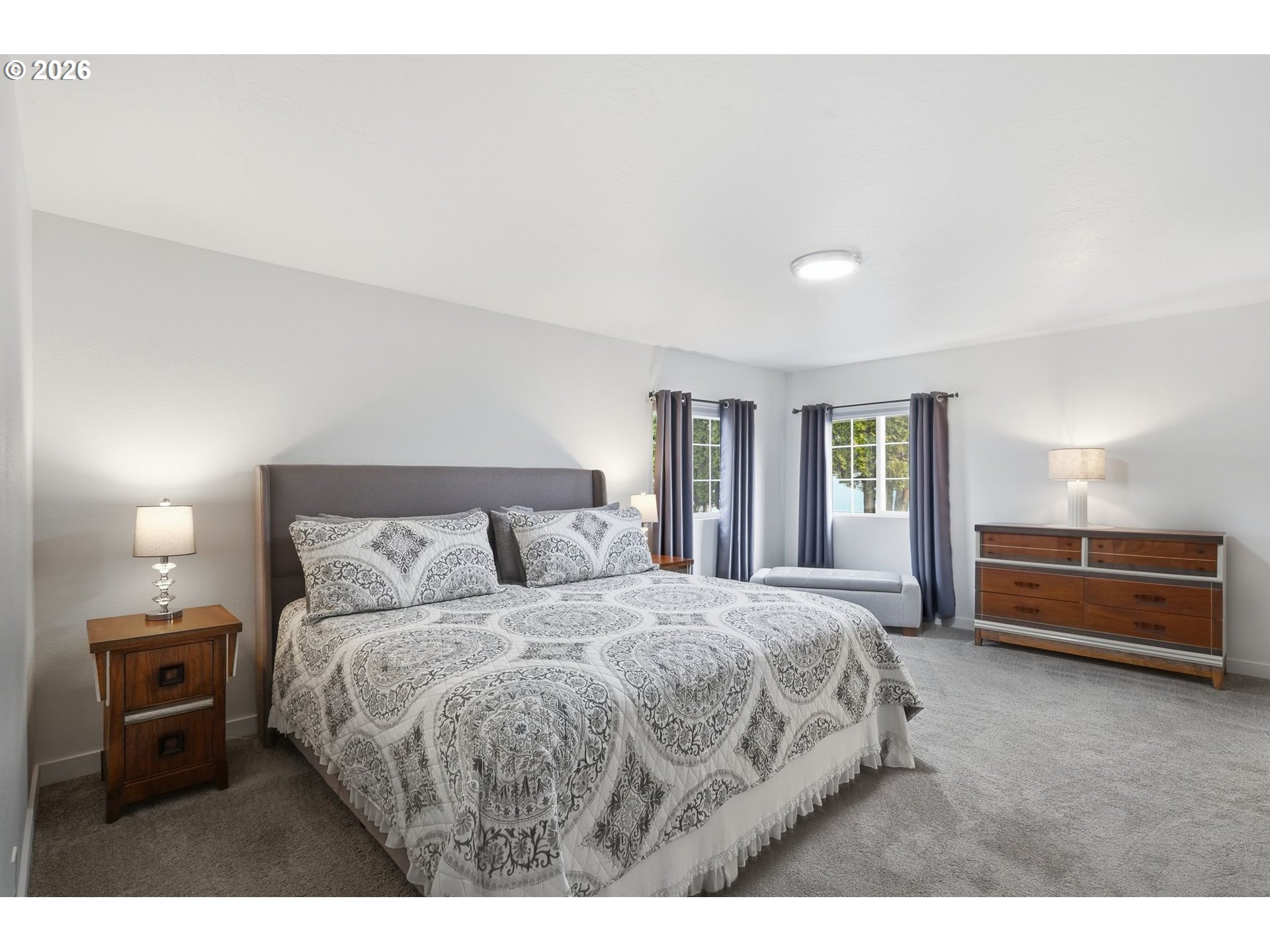 300 Southwest 7th Street, Unit 508 Battle Ground, WA 98604 - Photo 15 of 38 a bedroom with a bed and a view of bedroom