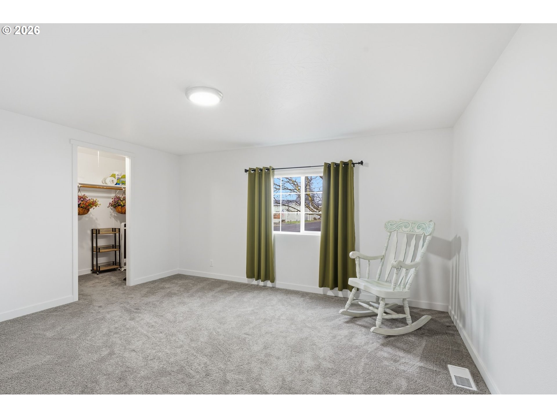 300 Southwest 7th Street, Unit 508 Battle Ground, WA 98604 - Photo 22 of 38 a living room with furniture and a chair