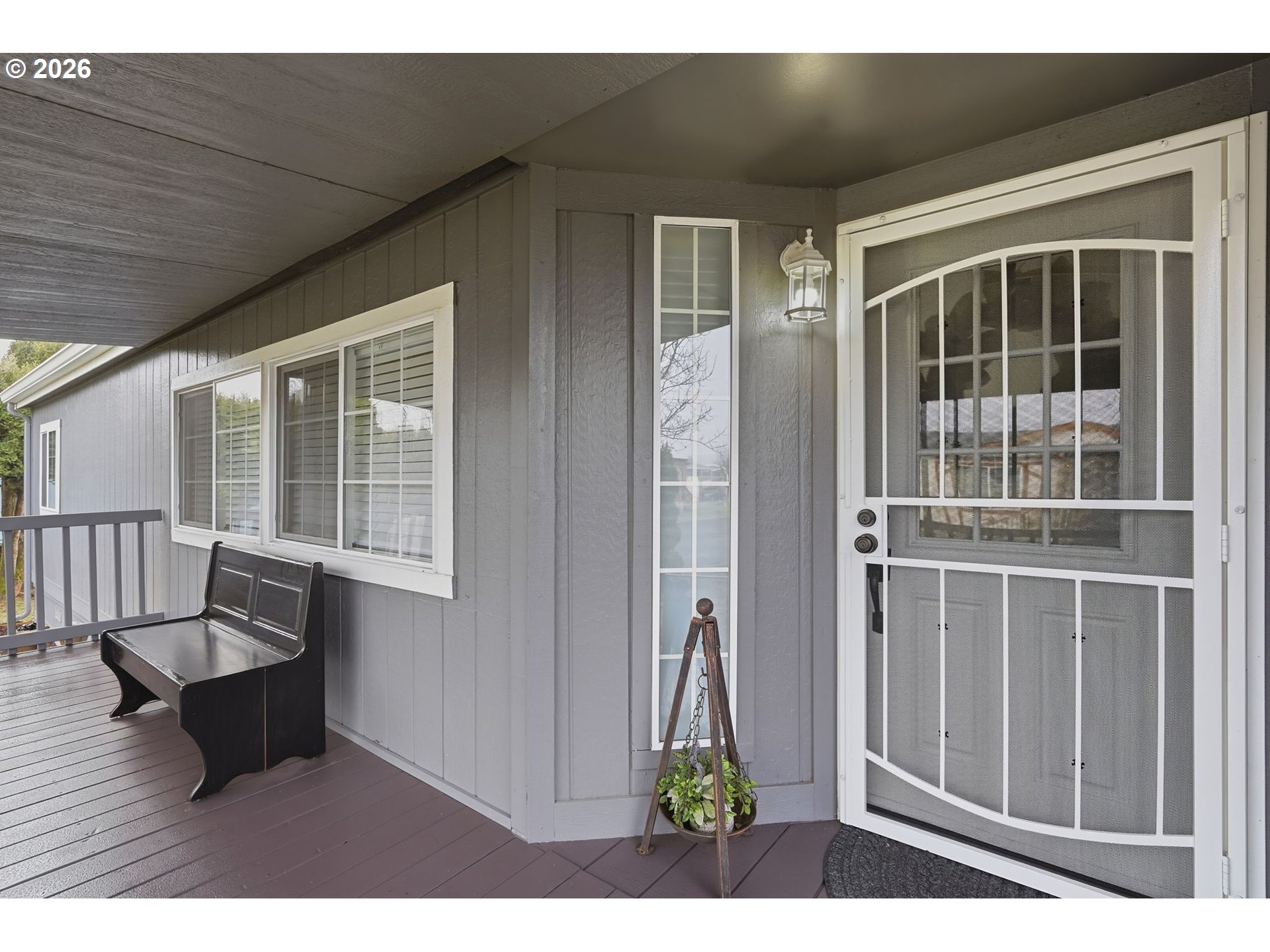 300 Southwest 7th Street, Unit 508 Battle Ground, WA 98604 - Photo 3 of 38 a balcony with table and chairs