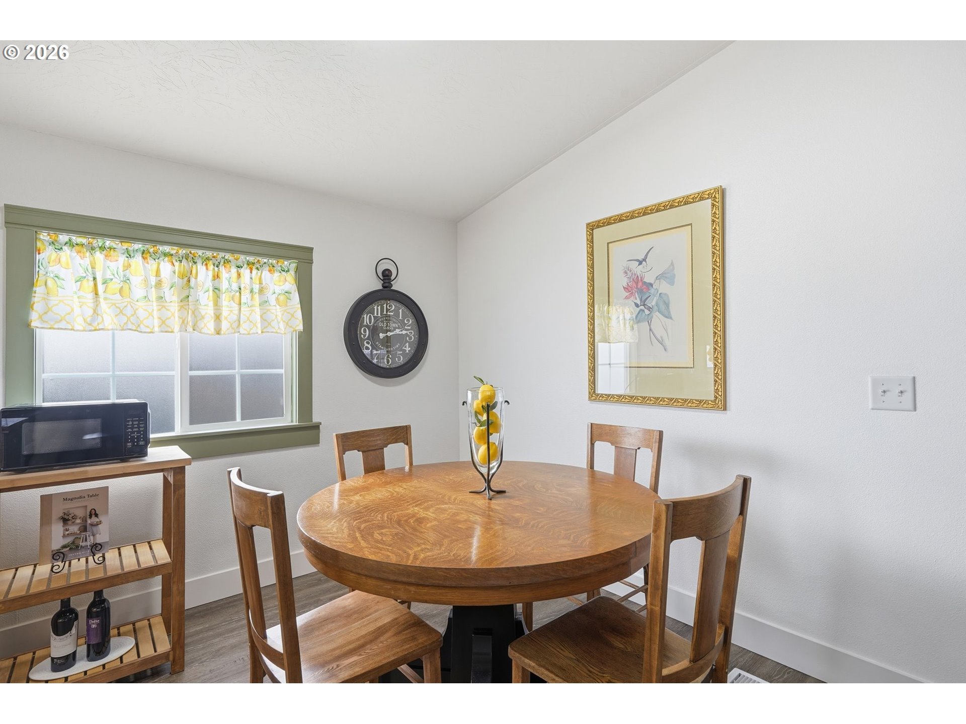 300 Southwest 7th Street, Unit 508 Battle Ground, WA 98604 - Photo 7 of 38 a view of a dining room with furniture and a large window