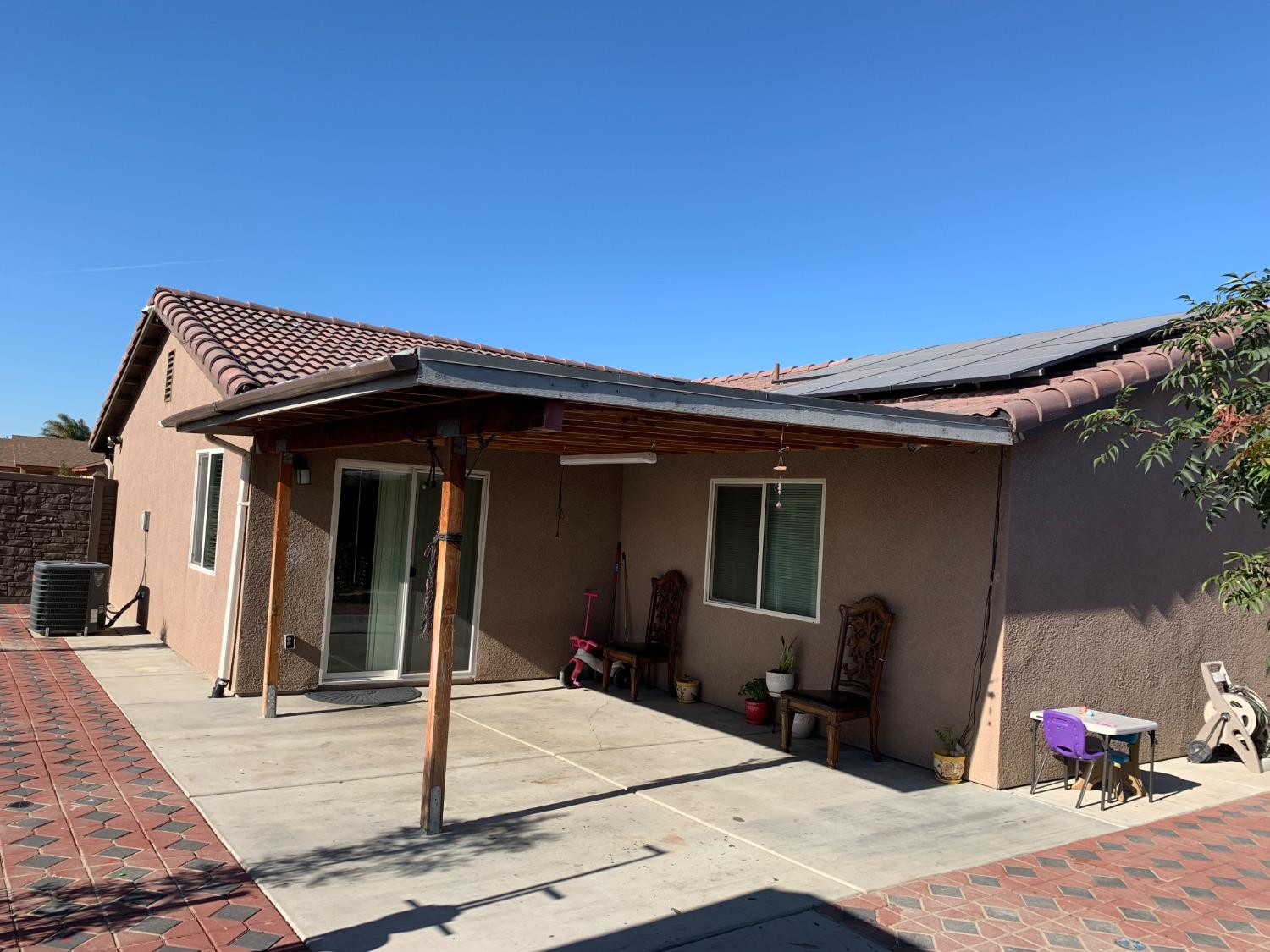 348 Silva Street Mendota, CA 93640 - Photo 12 of 24 a view of a house with patio