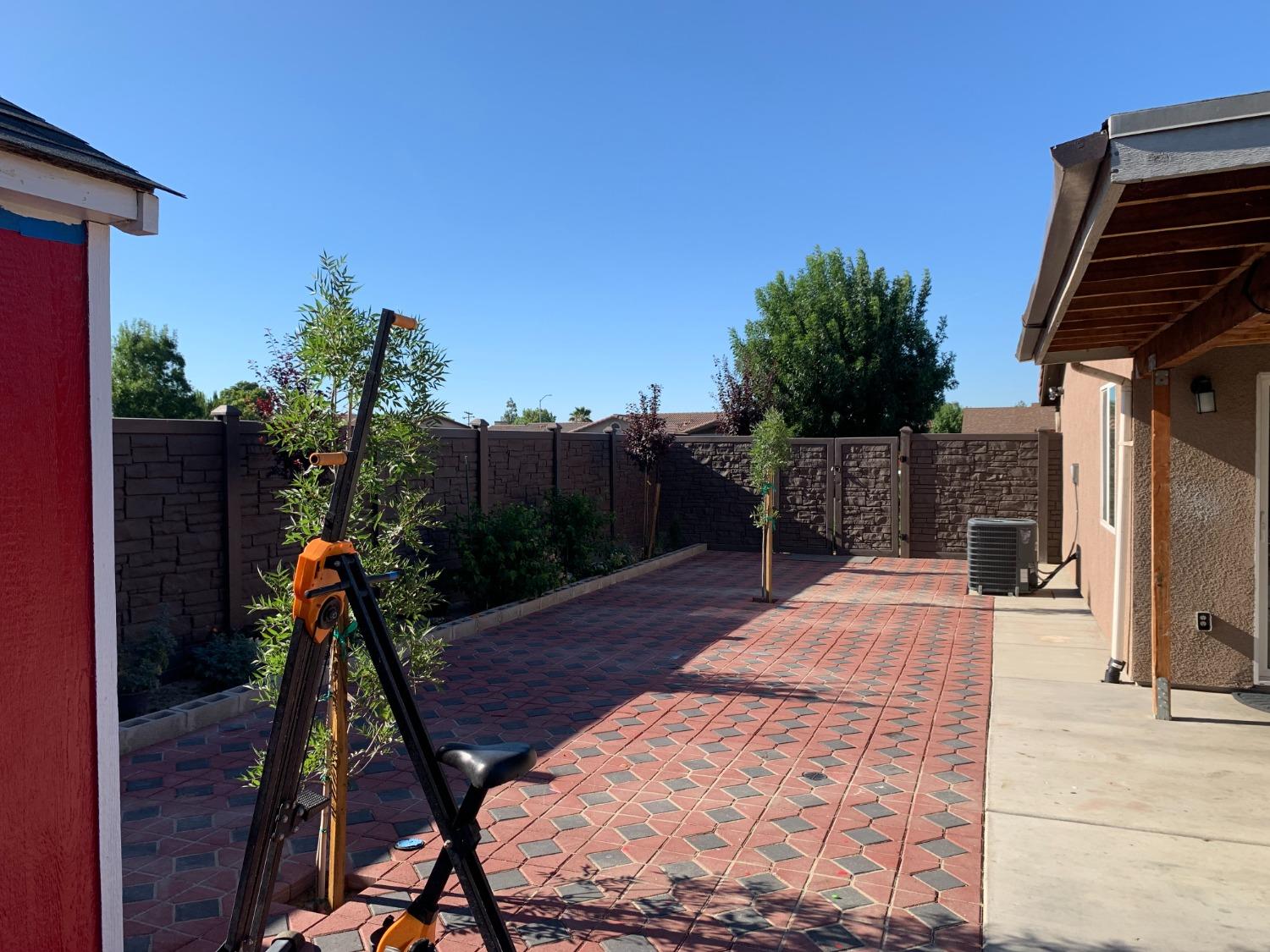 348 Silva Street Mendota, CA 93640 - Photo 23 of 24 a backyard of a house with table and chairs