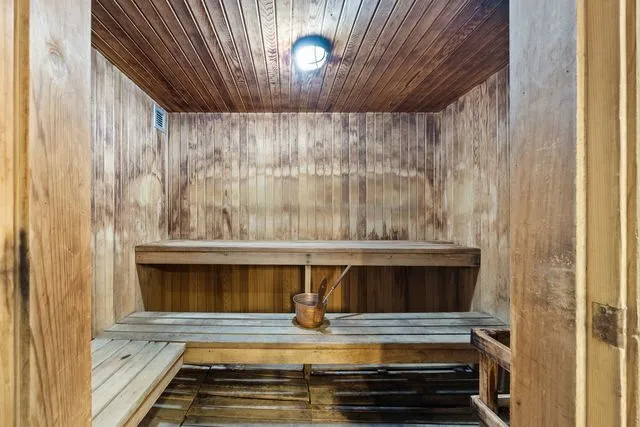 a view of room with wooden floor