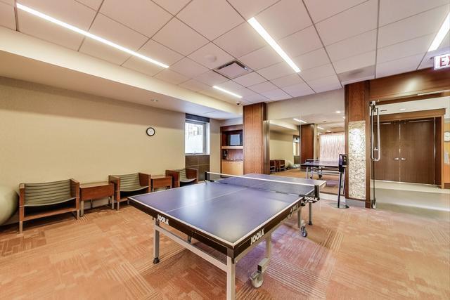 400 East Randolph Street, Unit 930 Chicago, IL 60601 - Photo 29 of 34 a room with pool table and windows