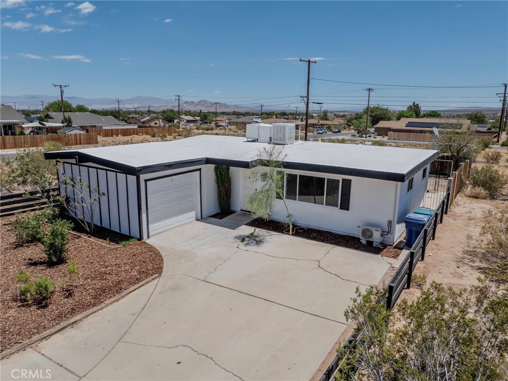 1504 South Yorktown Street Ridgecrest, CA 93555 - Photo 1 of 1 a view of a terrace with a barbeque