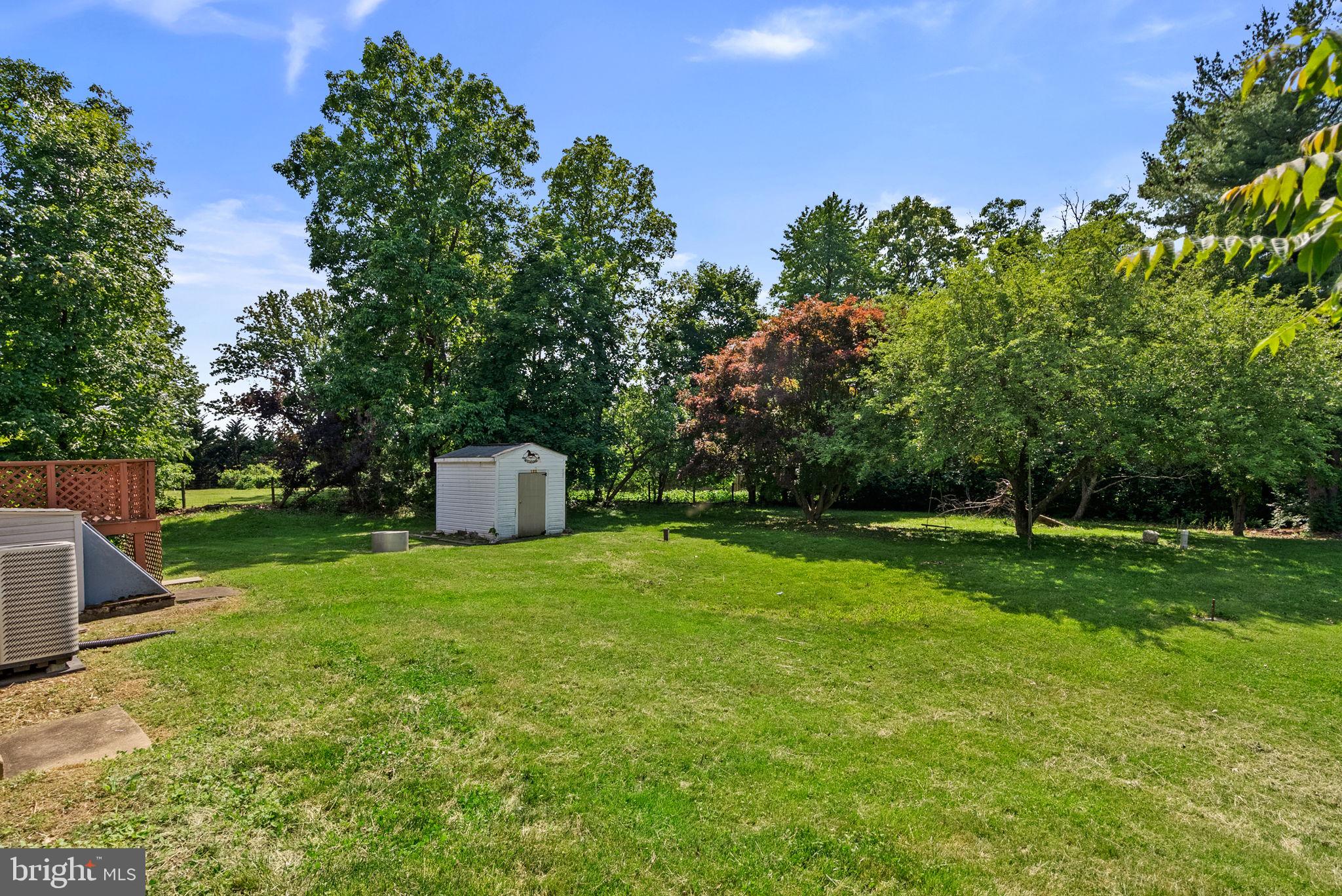 24000 Clarksburg Road Clarksburg, MD 20871 - Photo 58 of 60 a backyard of a house with lots of green space