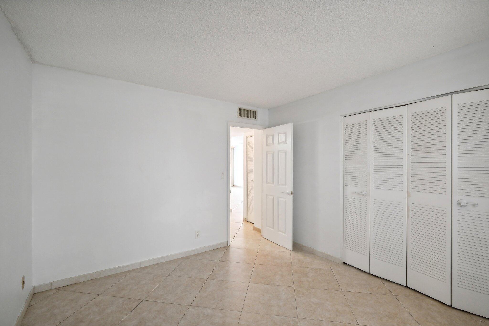 3580 South Ocean Boulevard, Unit 4C South Palm Beach, FL 33480 - Photo 20 of 36 a view of an empty room